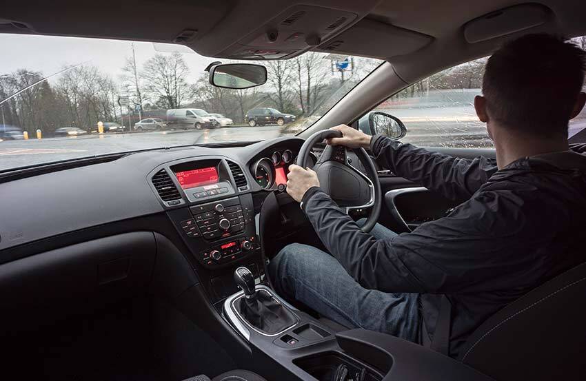 Man driving a car