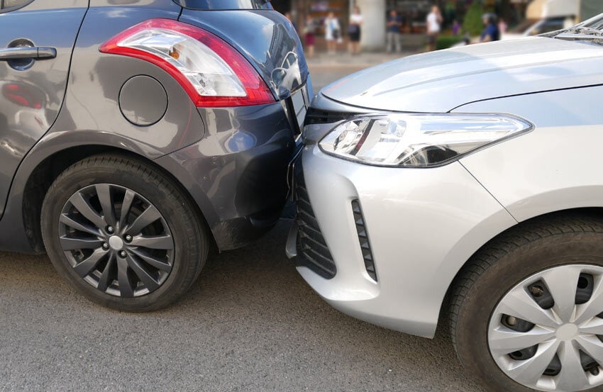 two cars touching after a collision