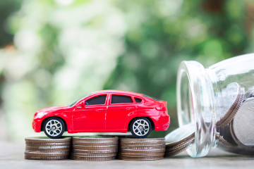 toy car on top of coins