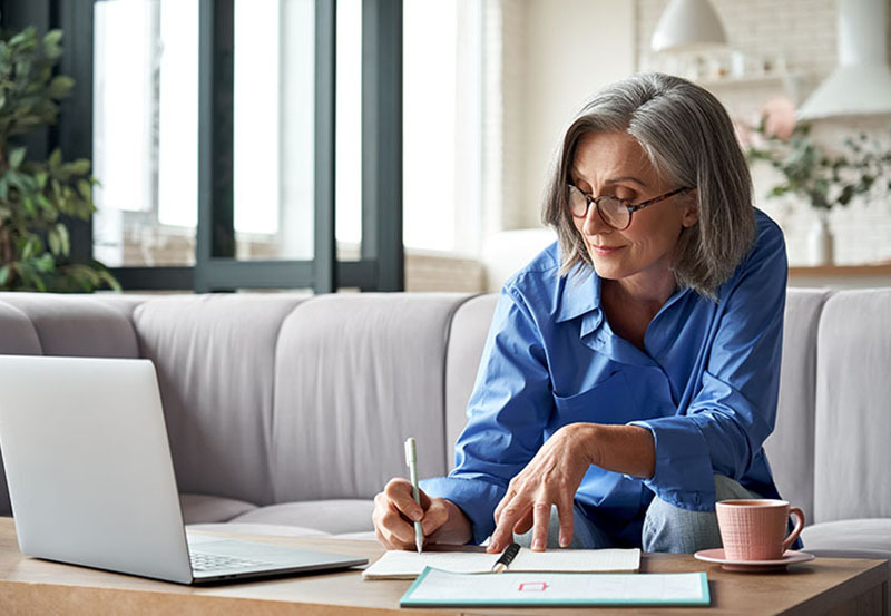 woman working at her desk at home