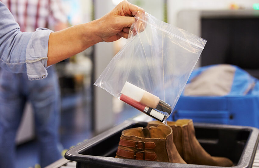 person holiday a clear plastic bag with travel liquids