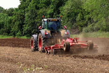 Tractor ploughing field